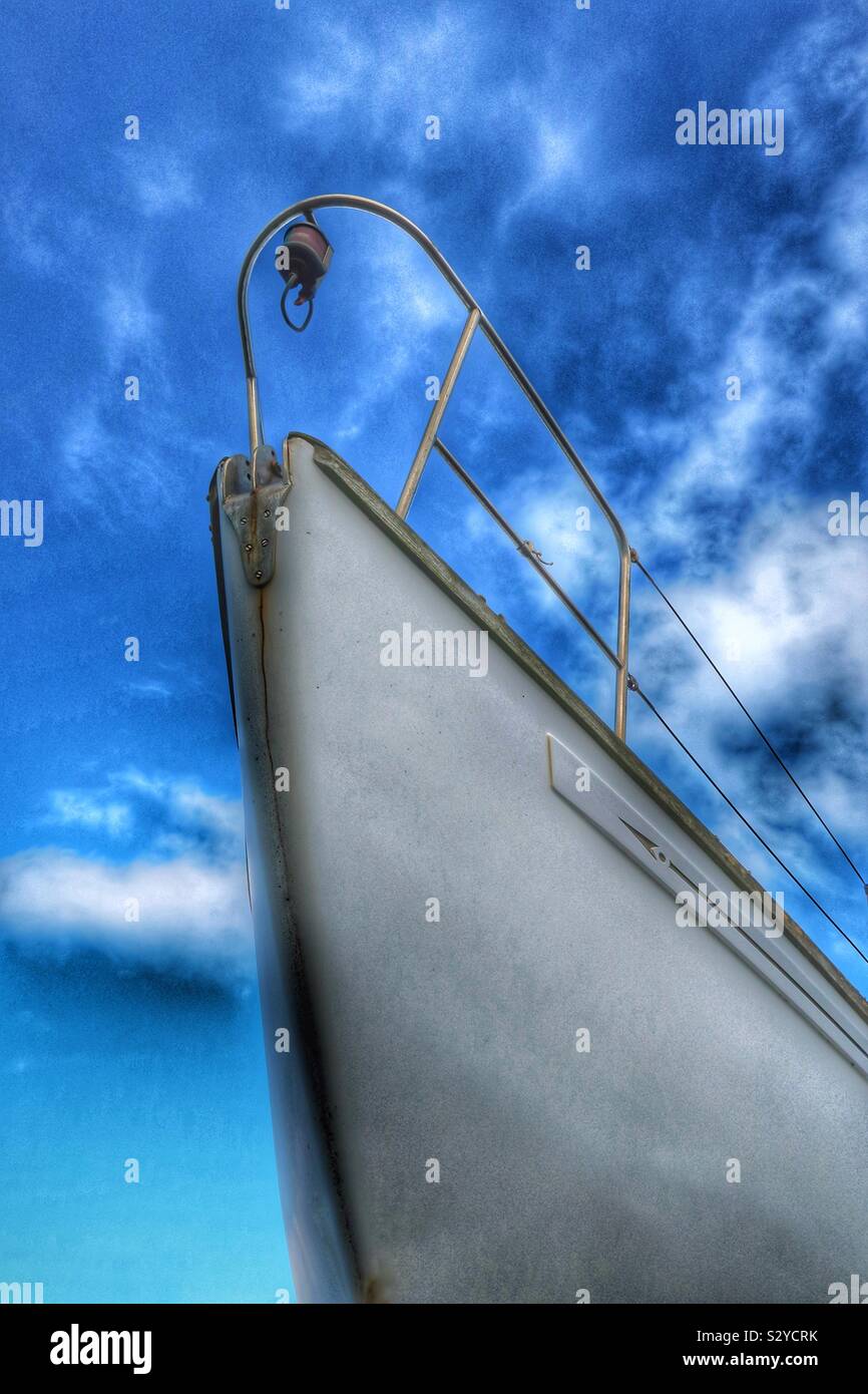 Bow of an expensive yacht against a dramatic sky, Troon, Scotland, UK - Smartphone Captured Stock Image
