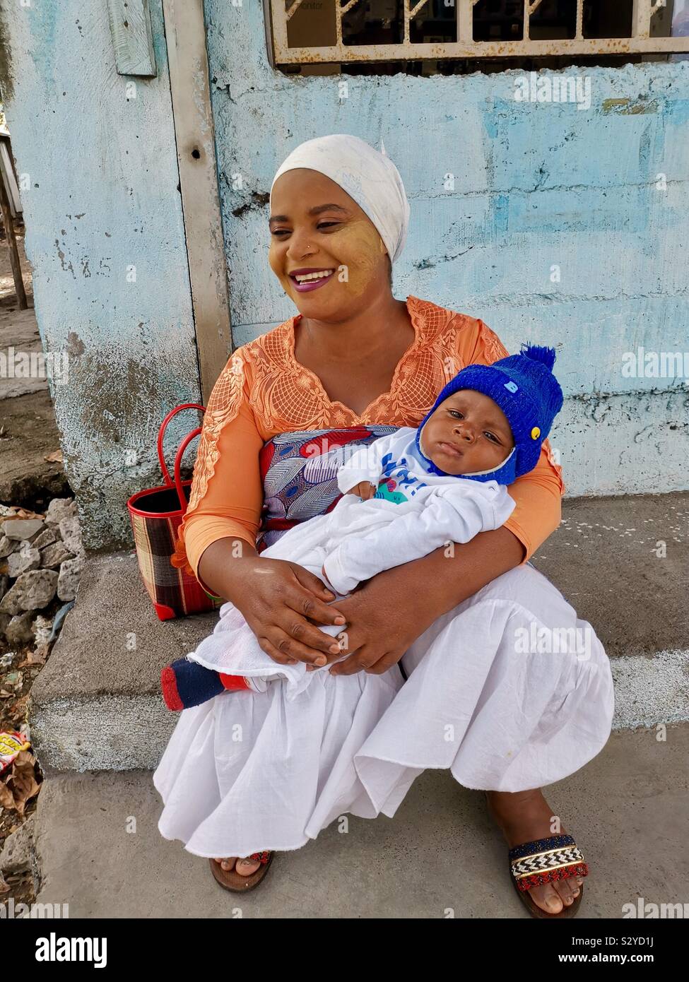 Portrait of a Comoran woman and her baby. - Smartphone Captured Stock Image