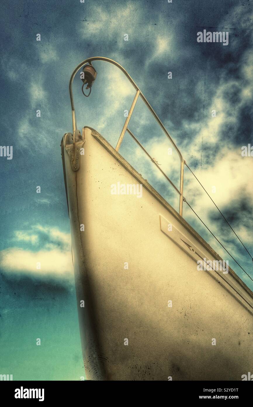 Bow of an expensive yacht against a dramatic sky, Troon, Scotland, UK - Smartphone Captured Stock Image