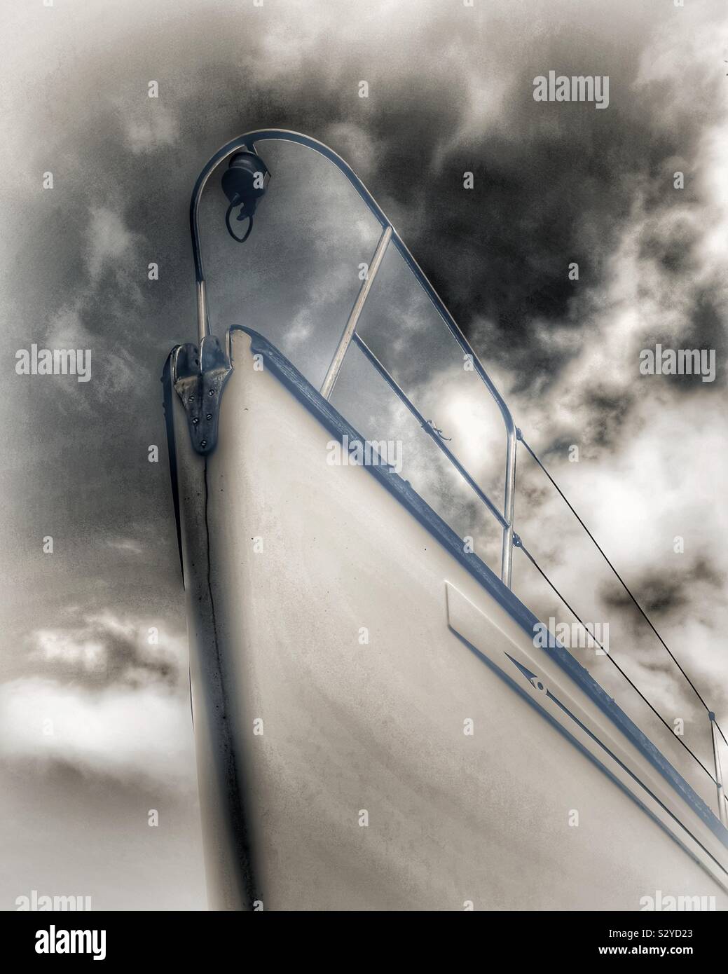 Bow of an expensive yacht against a dramatic sky, Troon, Scotland, UK - Smartphone Captured Stock Image