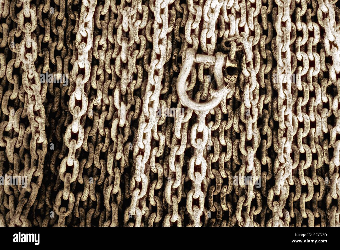 Industrial chains and metallic hasp, in sepia - Smartphone Captured Stock Image