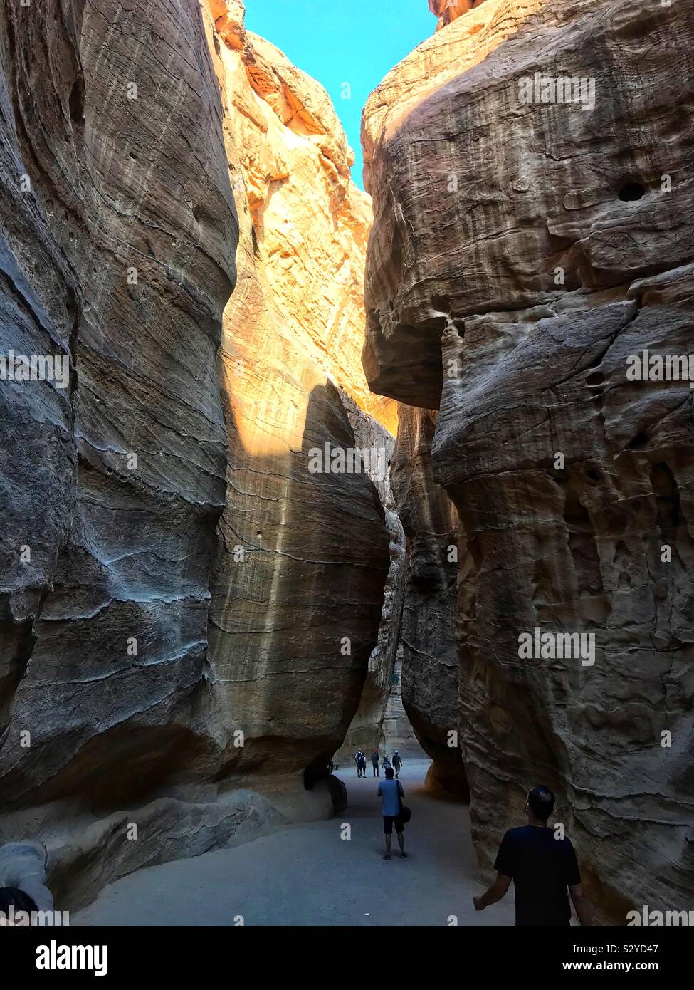 Walking through the siq at Petra. Jordan - Smartphone Captured Stock Image