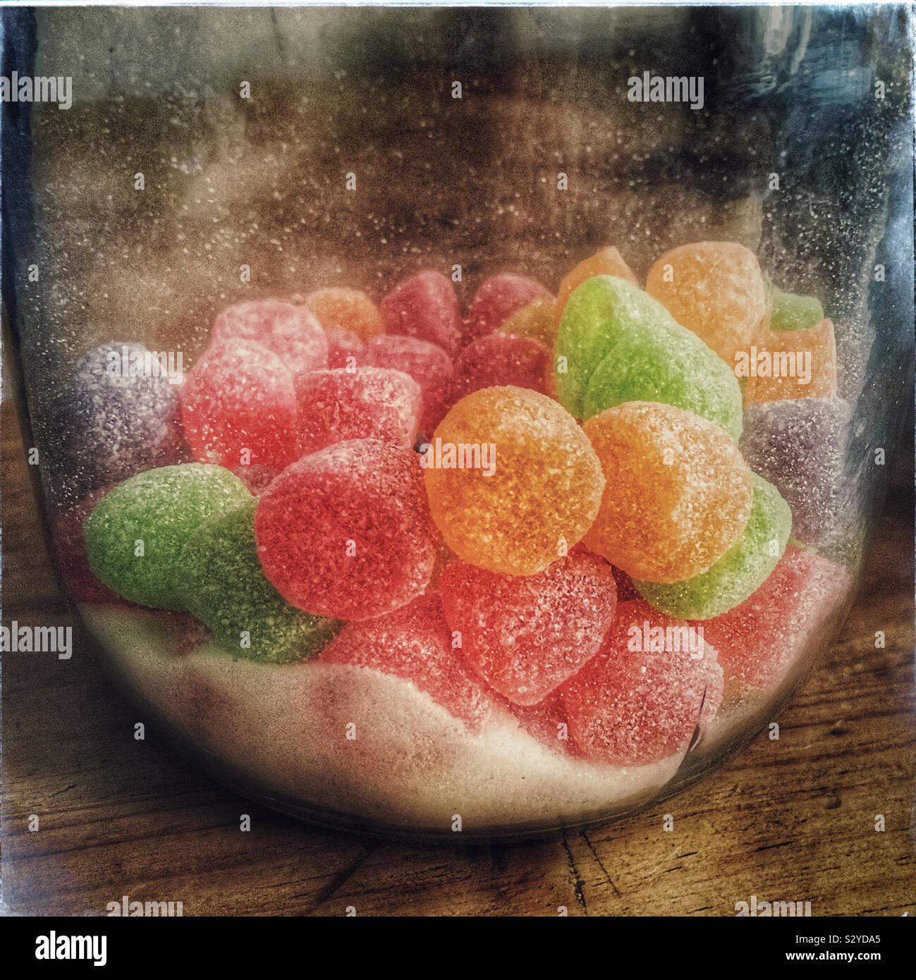 Sugar encrusted chewy fruit sweets in a jar - Smartphone Captured Stock Image