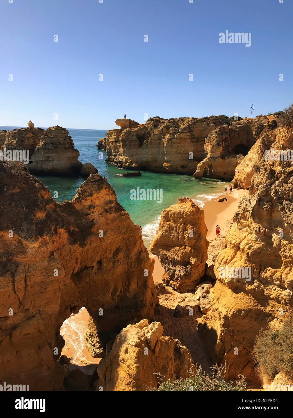 Magnificent rock formations at the beach called Praia Śao Rafael, the Algarve, Portugal - Smartphone Captured Stock Image