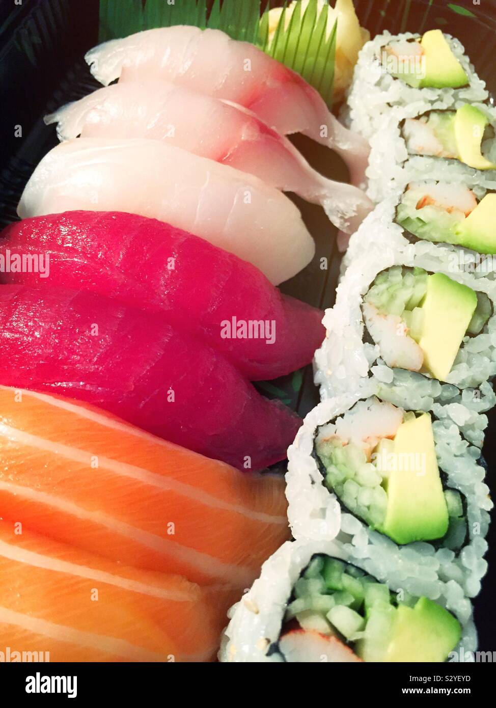 Close up of a gourmet Japanese sushi meal includes California roll - Smartphone Captured Stock Image