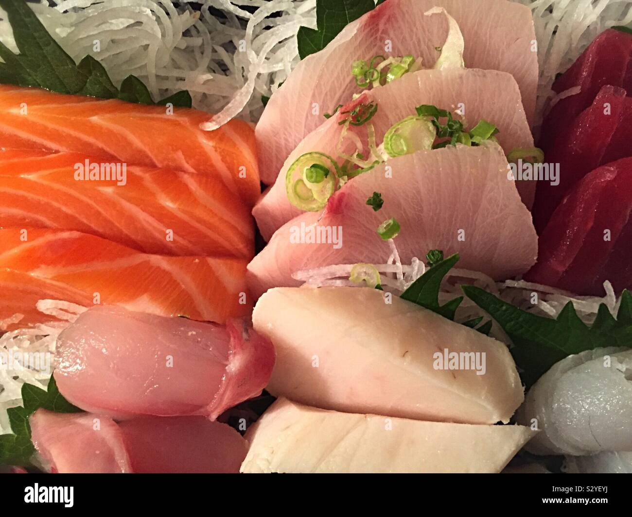 Flat lake close up of a Japanese dinner of sashimi - Smartphone Captured Stock Image