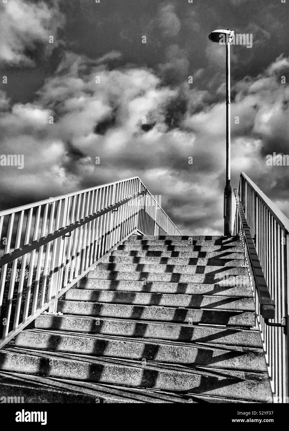 Concrete stairway rising to a street lamp post , Scotland, UK - Smartphone Captured Stock Image