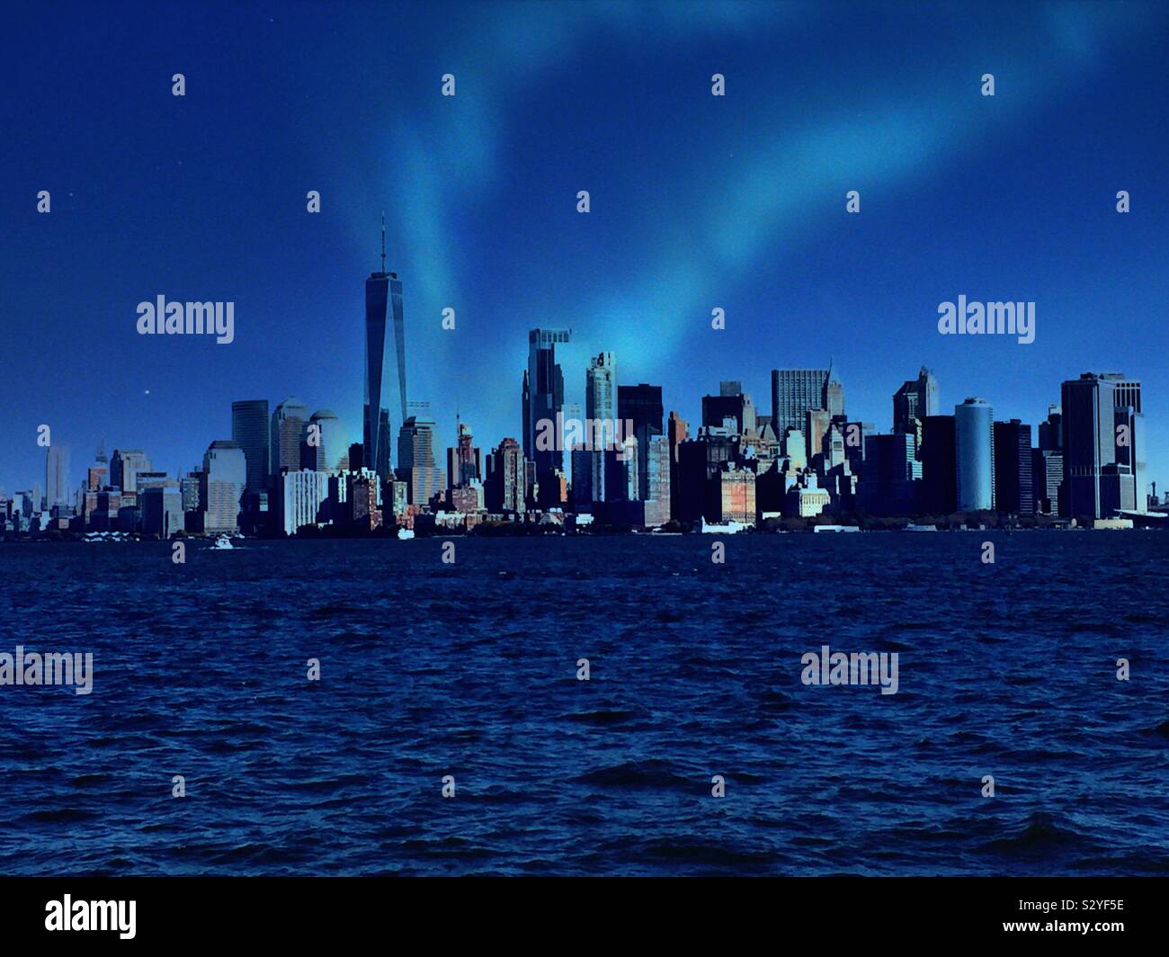 Southern tip of the island guideline as seen from New York Harbor at dusk, NYC, USA - Smartphone Captured Stock Image