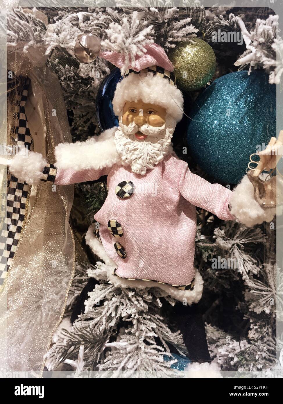 Mackenzie-Childs is an upscale home decor store in Soho which features Christmas displays and Santa Claus figurines, NYC, USA - Smartphone Captured Stock Image