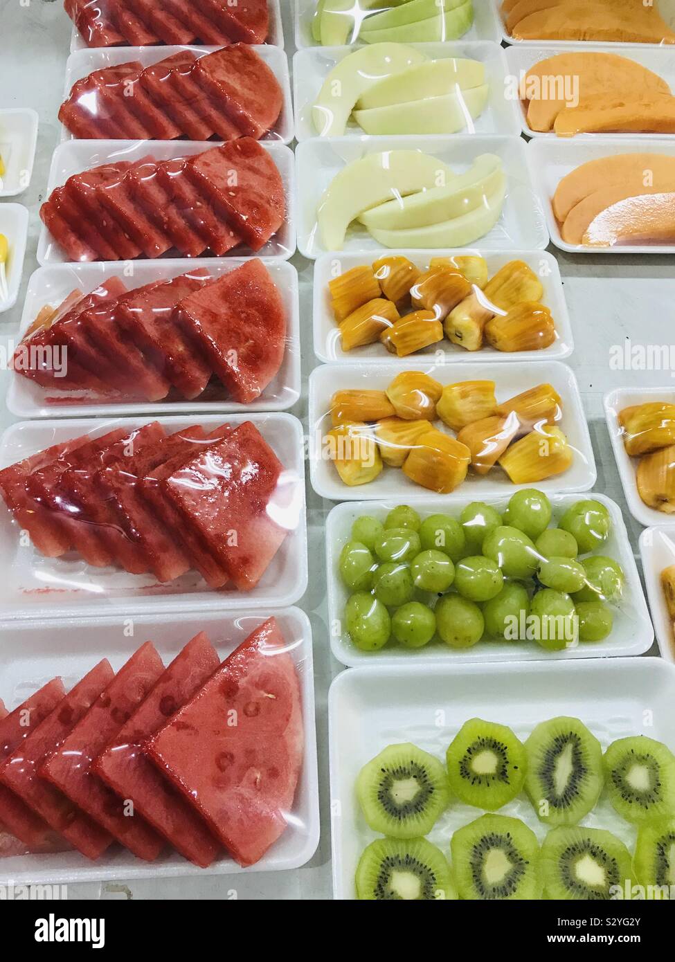 Cut fruits inline for sale Stock Photo Alamy