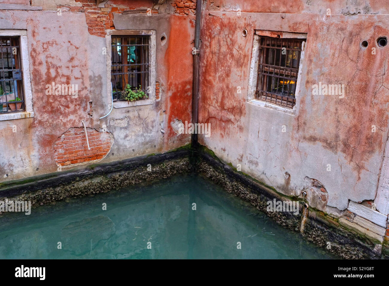 A colourful corner of two houses in Venice - Smartphone Captured Stock Image A colourful corner of two houses in Venice - Smartphone Captured Stock Image