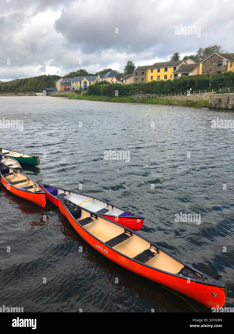 Boats on the water beside Pembroke Castle, Pembrokeshire, Wales, UK. - Smartphone Captured Stock Image