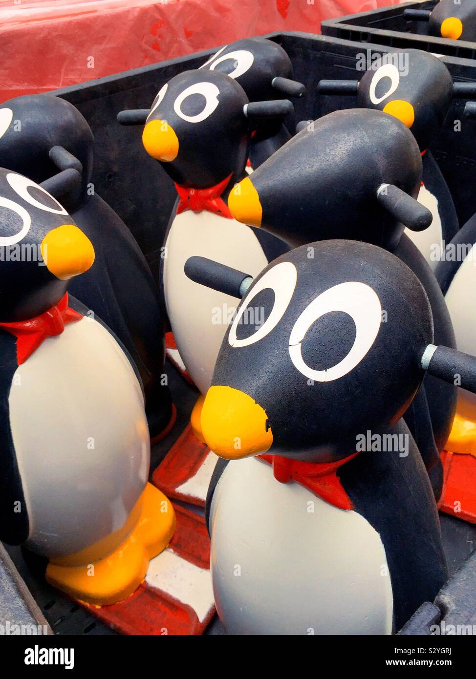 Ice skate.  helpers in the shape of penguins - Smartphone Captured Stock Image