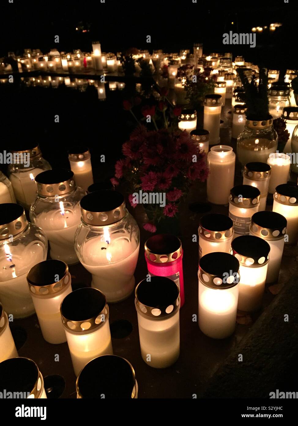 Graveyard late in the evening at Halloween in Sweden. - Smartphone Captured Stock Image