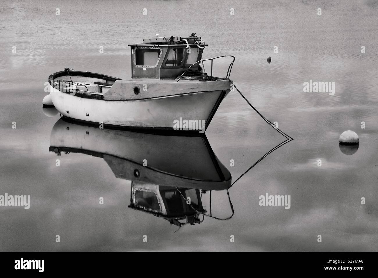 Fishing boat in a calm harbour, Irvine, Ayrshire, Scotland, UK - Smartphone Captured Stock Image