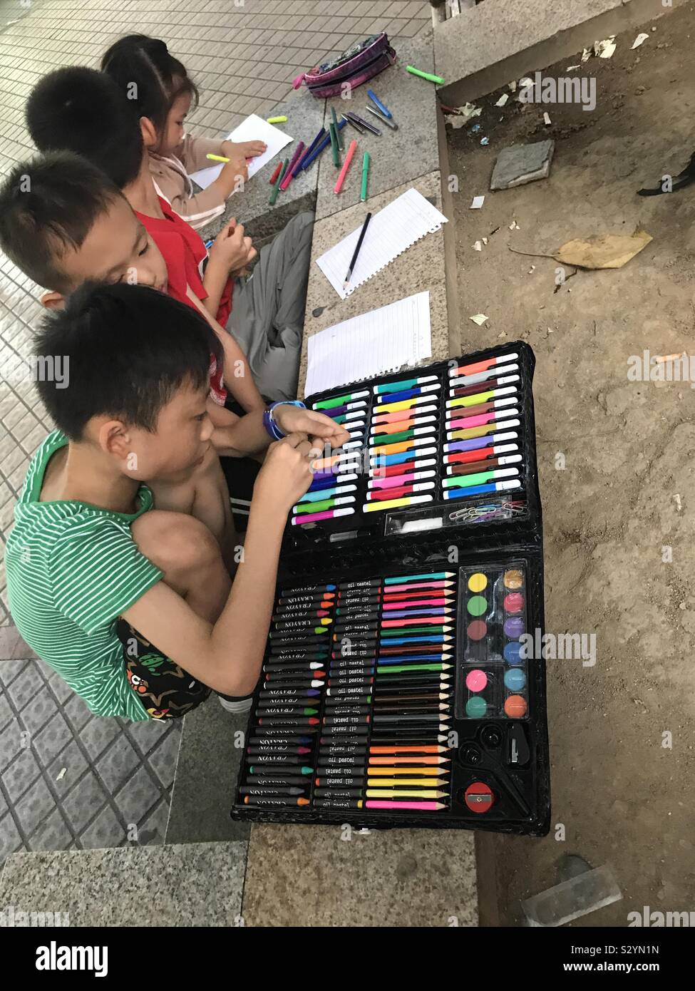 Children playing with colors - Smartphone Captured Stock Image