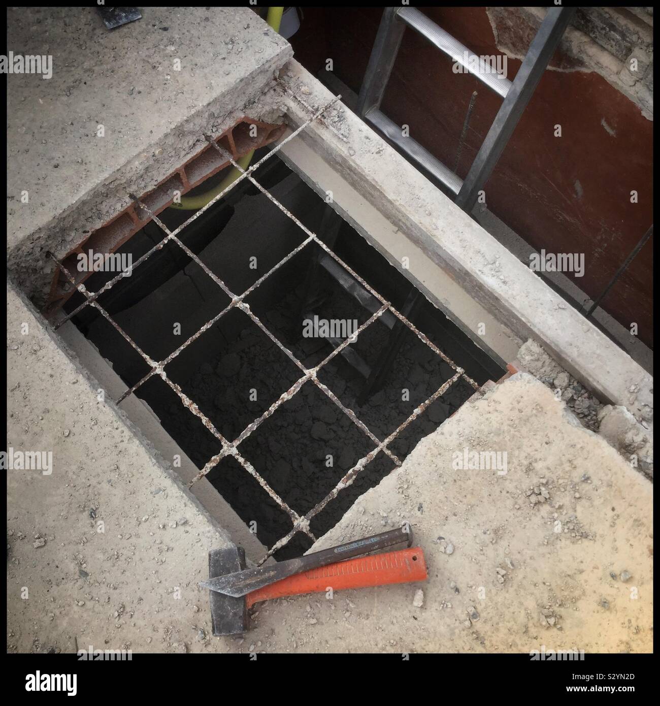 Construction cutting a hole in concrete, Catalonia, Spain Stock Photo