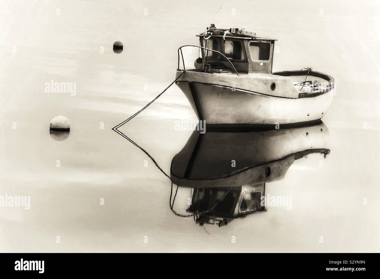 Small boat in Irvine harbour, Ayrshire, Scotland, UK - Smartphone Captured Stock Image