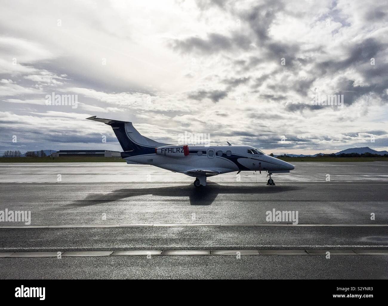 Embraer Phenom 100 private plane at Biarritz airport, France. Stock Photo