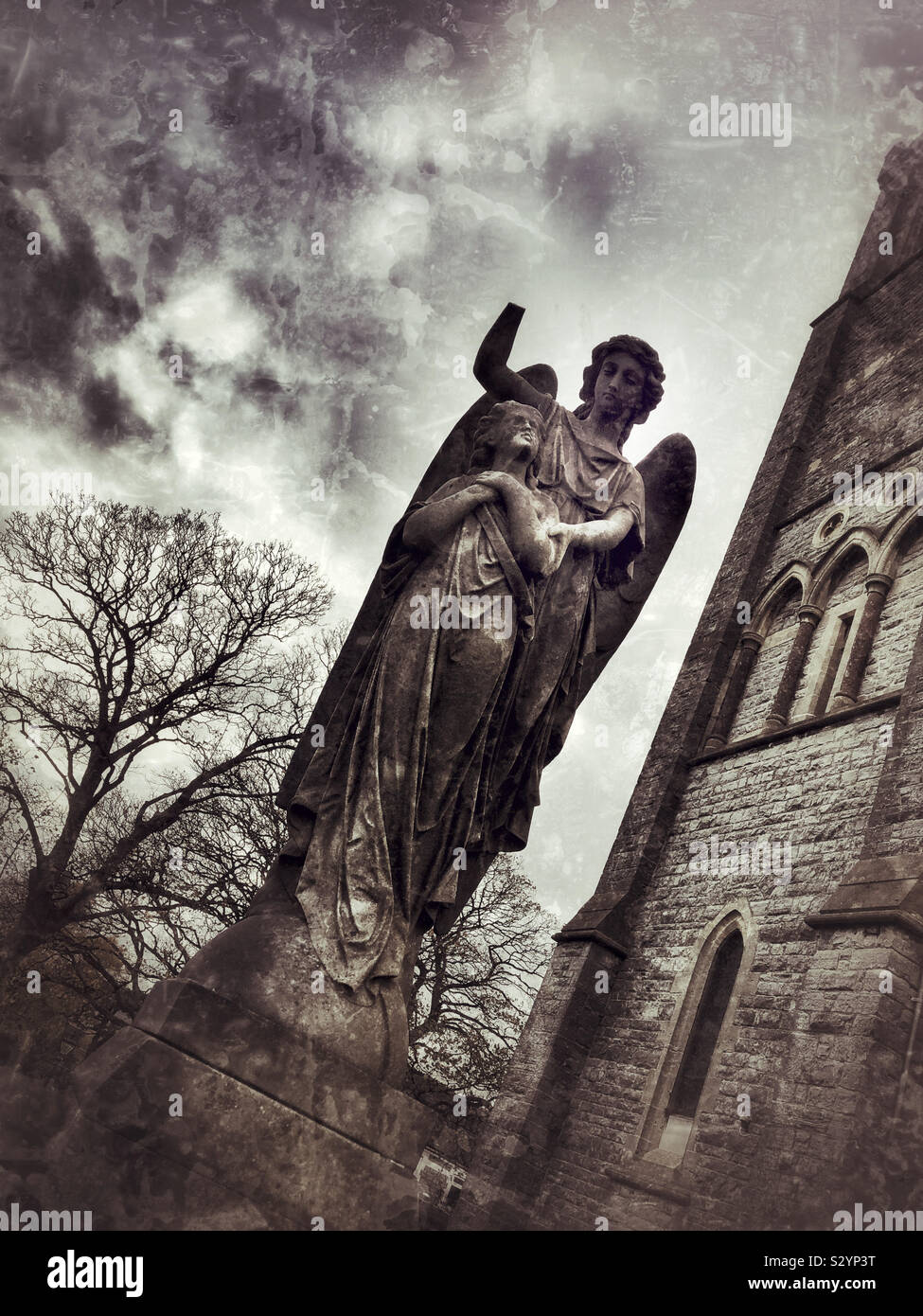 Angel tombstone in a graveyard - Smartphone Captured Stock Image