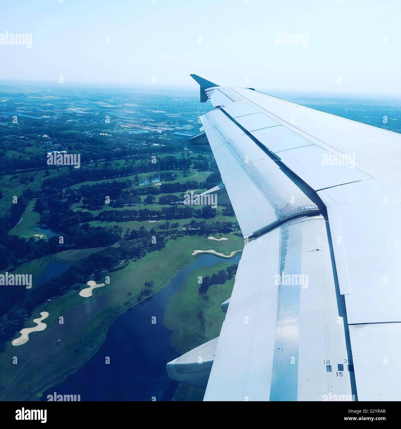 Flying over a golf course in Myanmar. - Smartphone Captured Stock Image