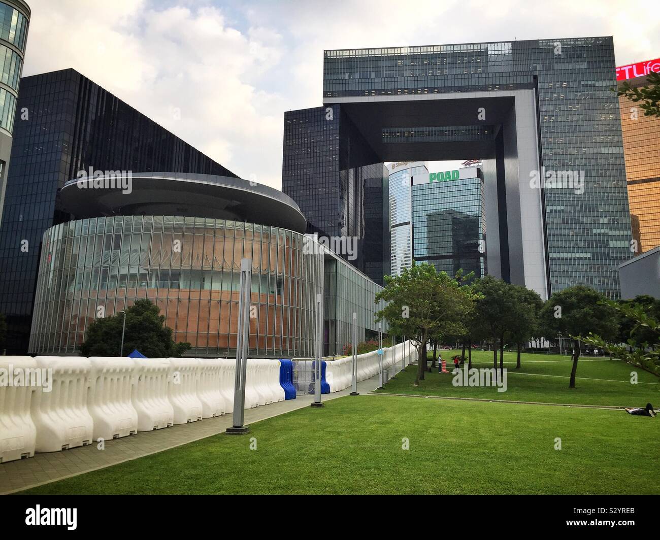 The new face of Hong Kong: the Legislative Council building barricaded behind 2-meter high water-filled barriers during the protests in October 2019 - Smartphone Captured Stock Image