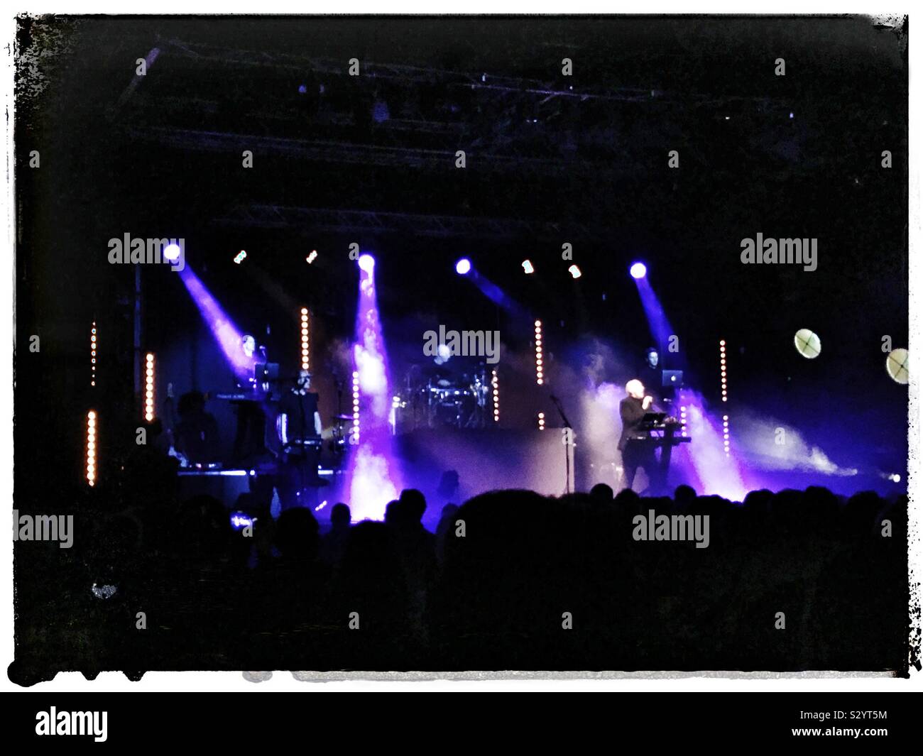 Midge Ure in concert, Corn Exchange, Ipswich, Suffolk, UK. - Smartphone Captured Stock Image