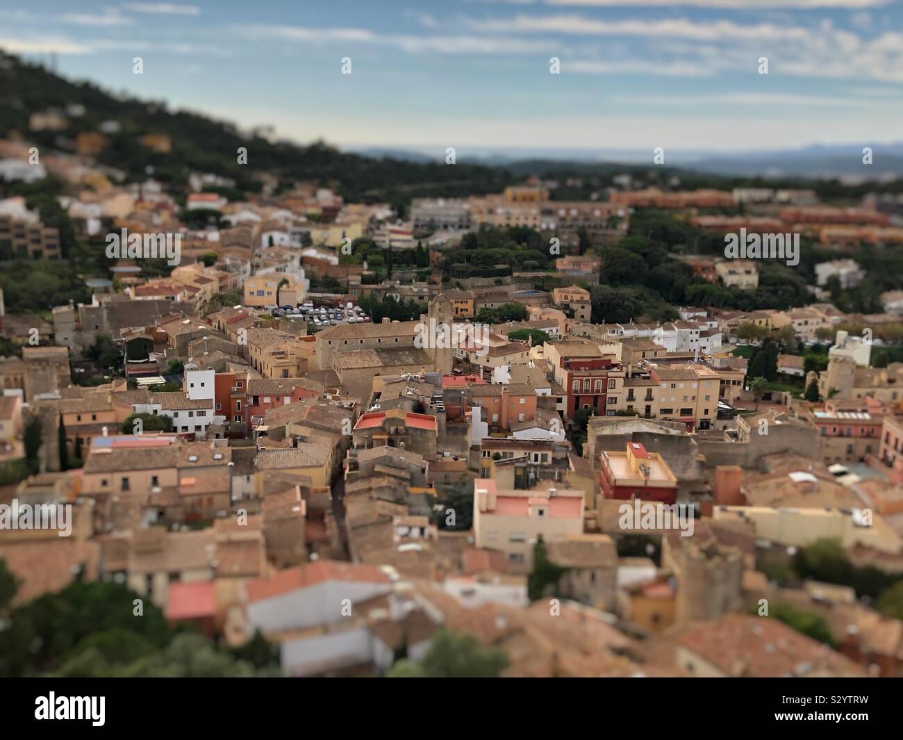 Views over the old Spanish town of Begur, Catalunya, from the castle ruins. Lens blur effect. Stock Photo
