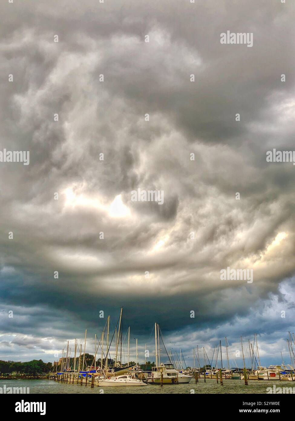 Ominous sky over boat marina Stock Photo