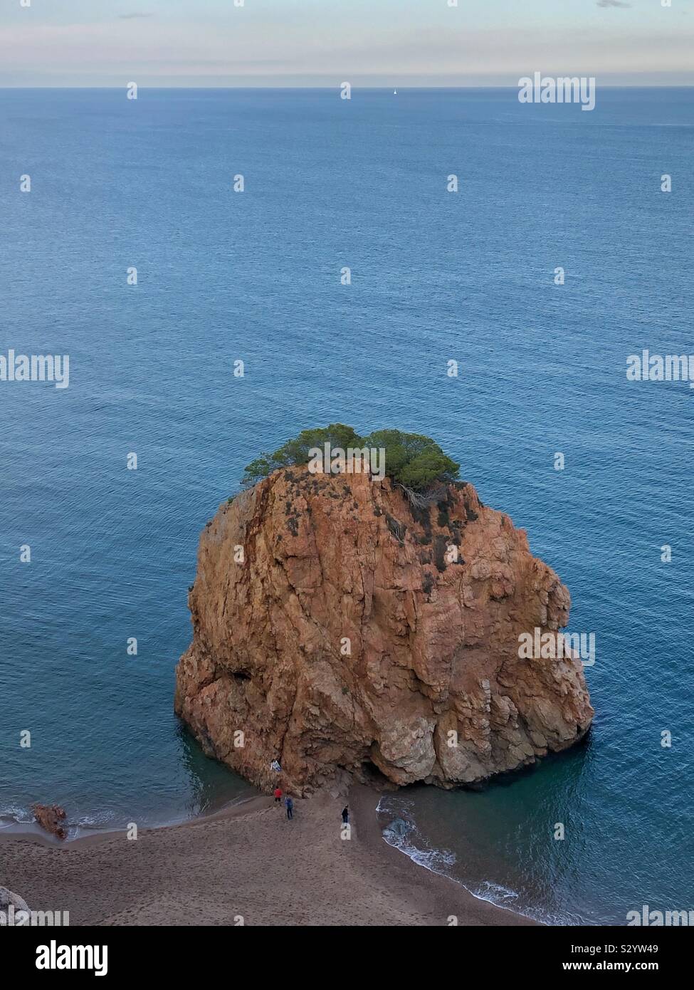 Isla Roja is a rock on L’Illa Roja beach near Sa Riera, Begur on Costa Brava in Spain. - Smartphone Captured Stock Image