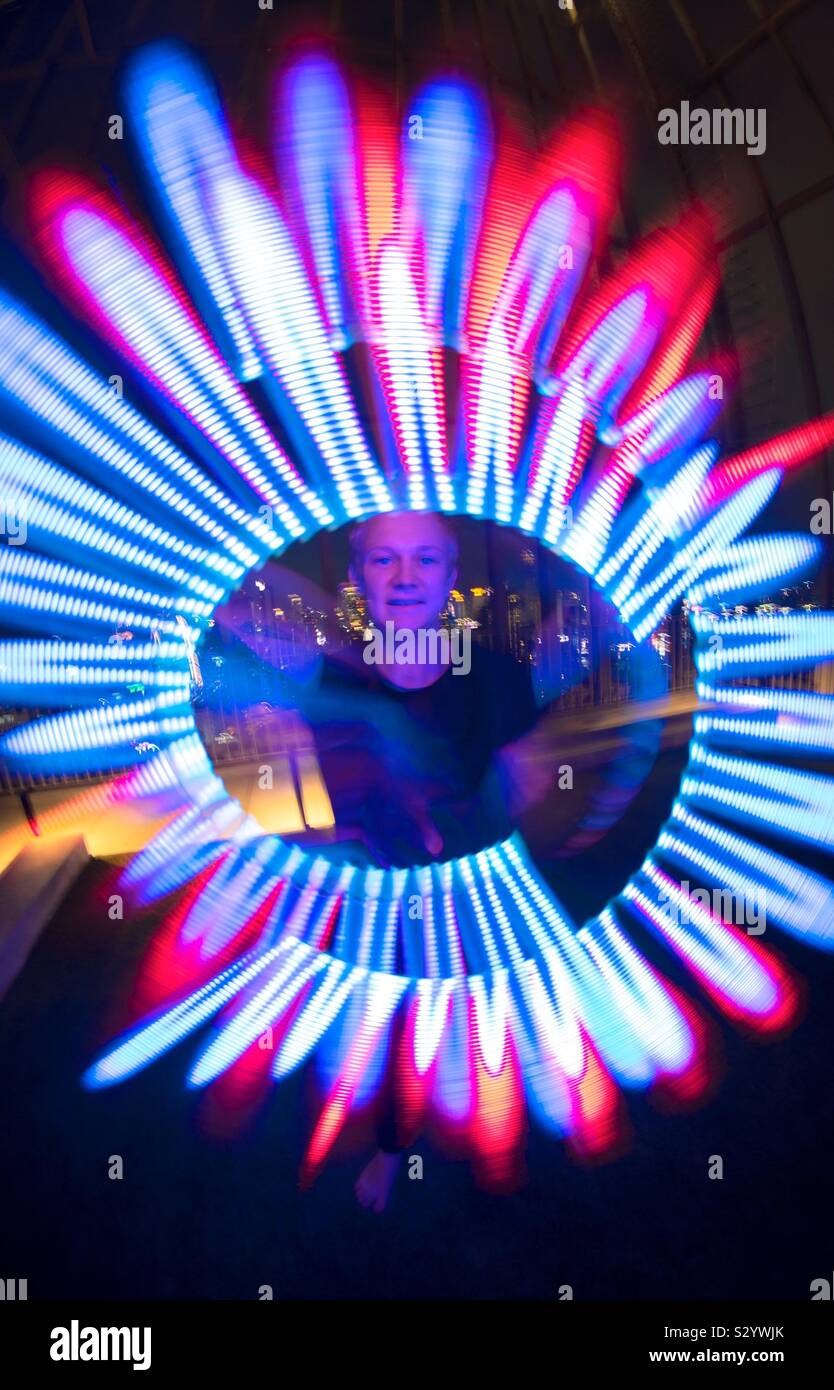 Light Sticks performer - Smartphone Captured Stock Image