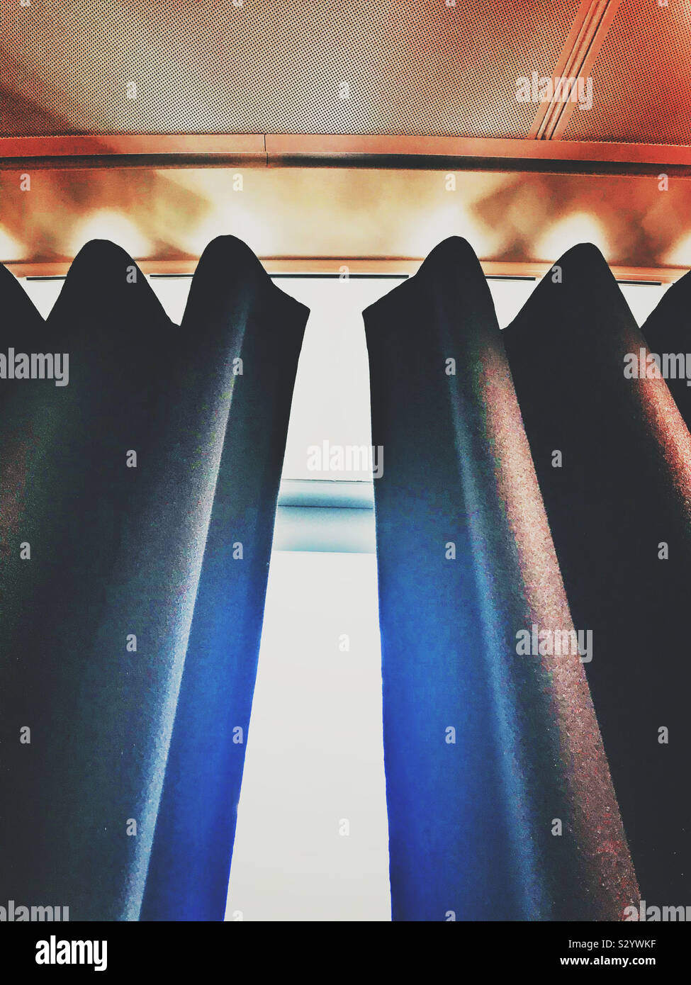 Daylight coming through a set of curtains - Smartphone Captured Stock Image