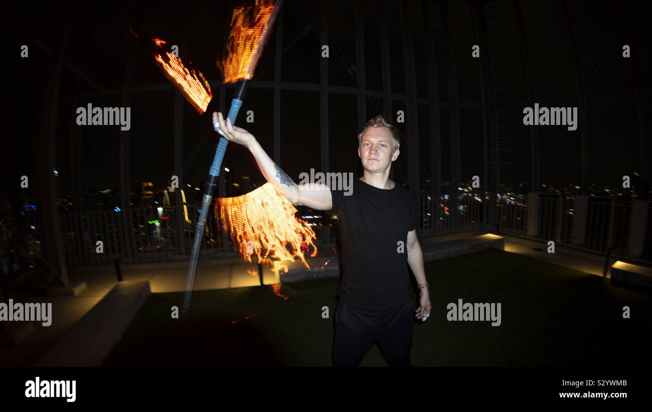 Light Sticks performer - Smartphone Captured Stock Image