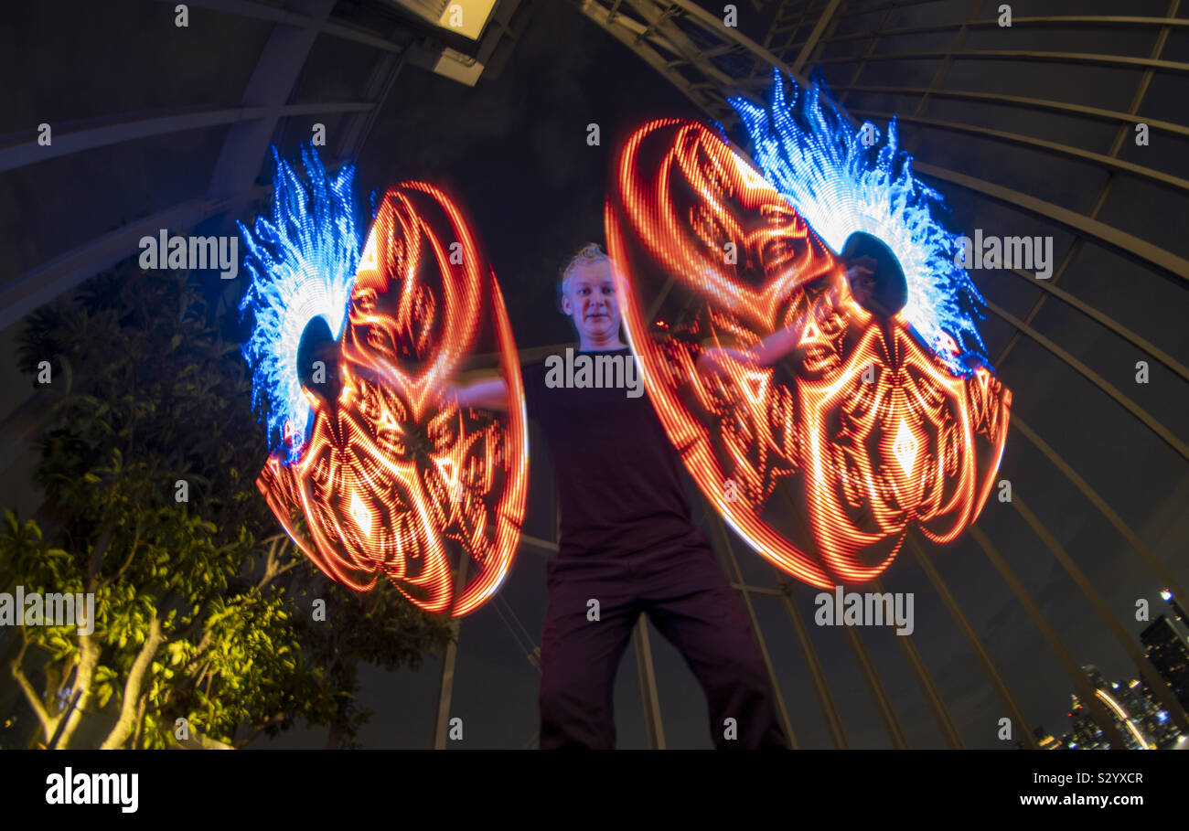 Light Sticks performer - Smartphone Captured Stock Image