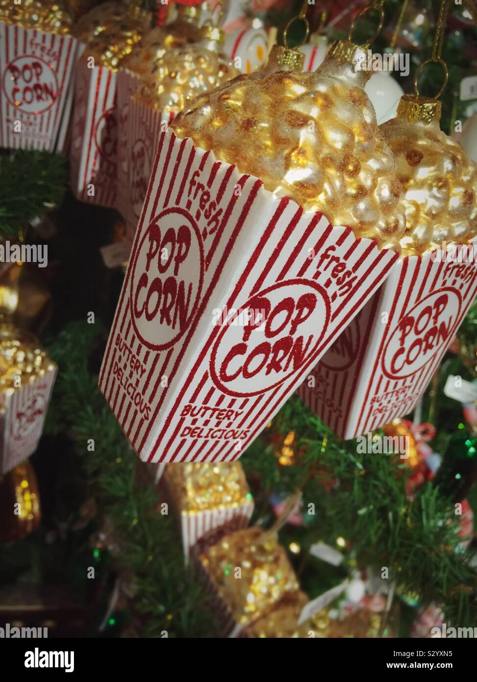 Close up of popcorn Christmas ornament hanging on a holiday tree, USA Stock Photo