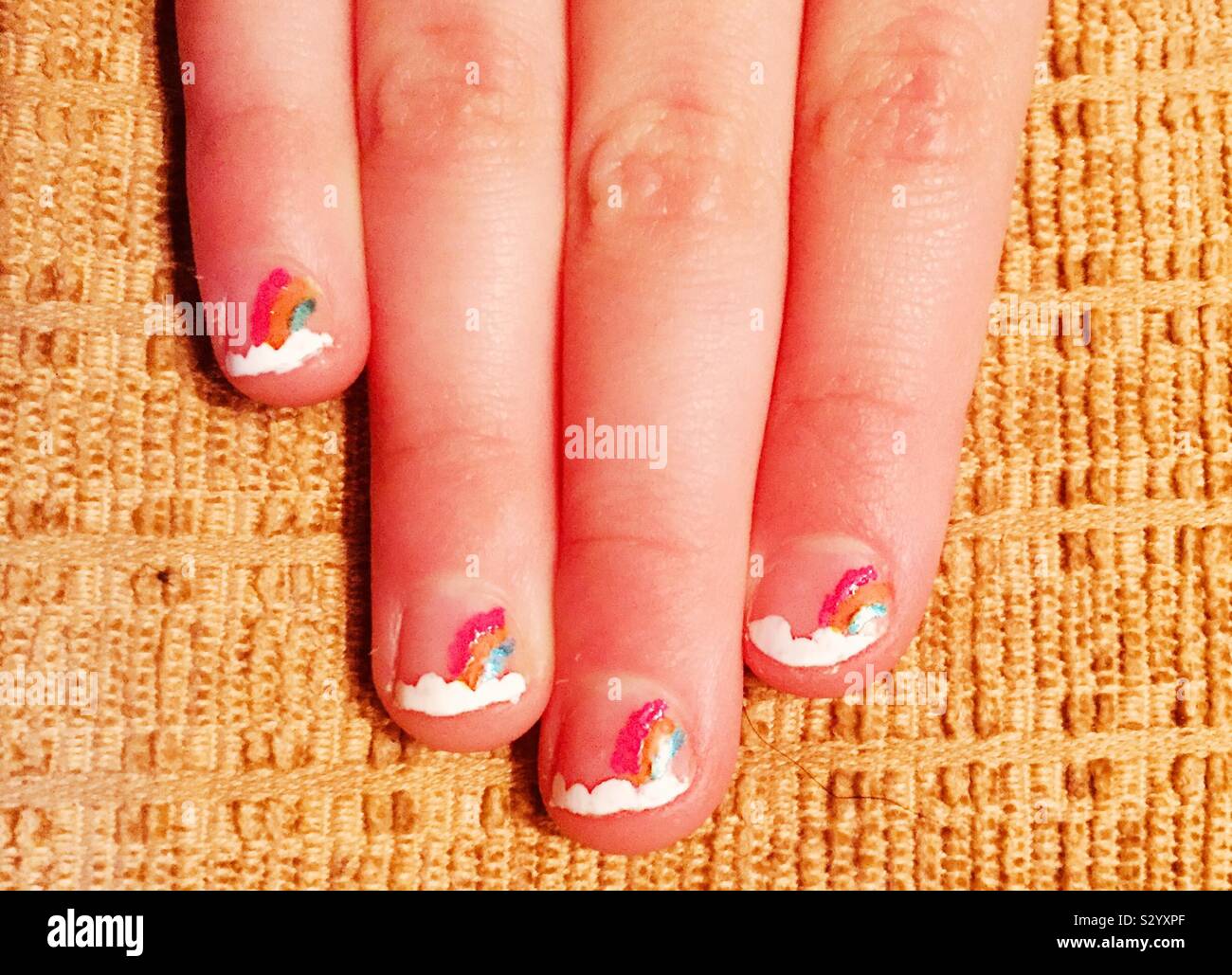 Children’s rainbow nail varnish Stock Photo Alamy