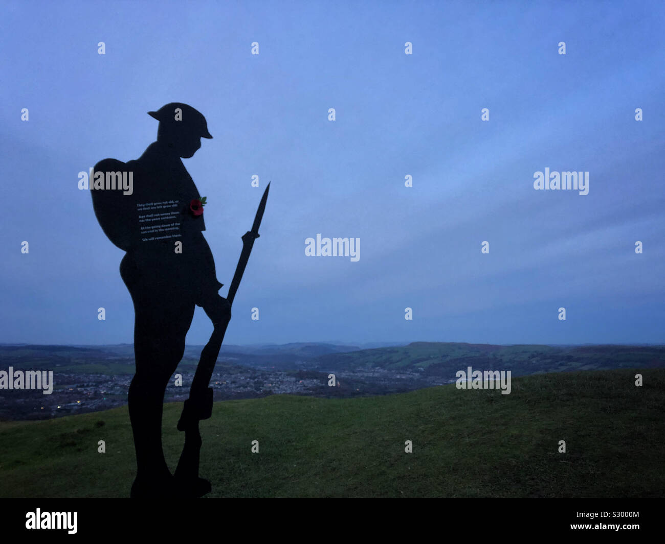 Wooden Soldier silhouette on the Garth mountain, South Wales, Remembrance Sunday, November 2019. - Smartphone Captured Stock Image