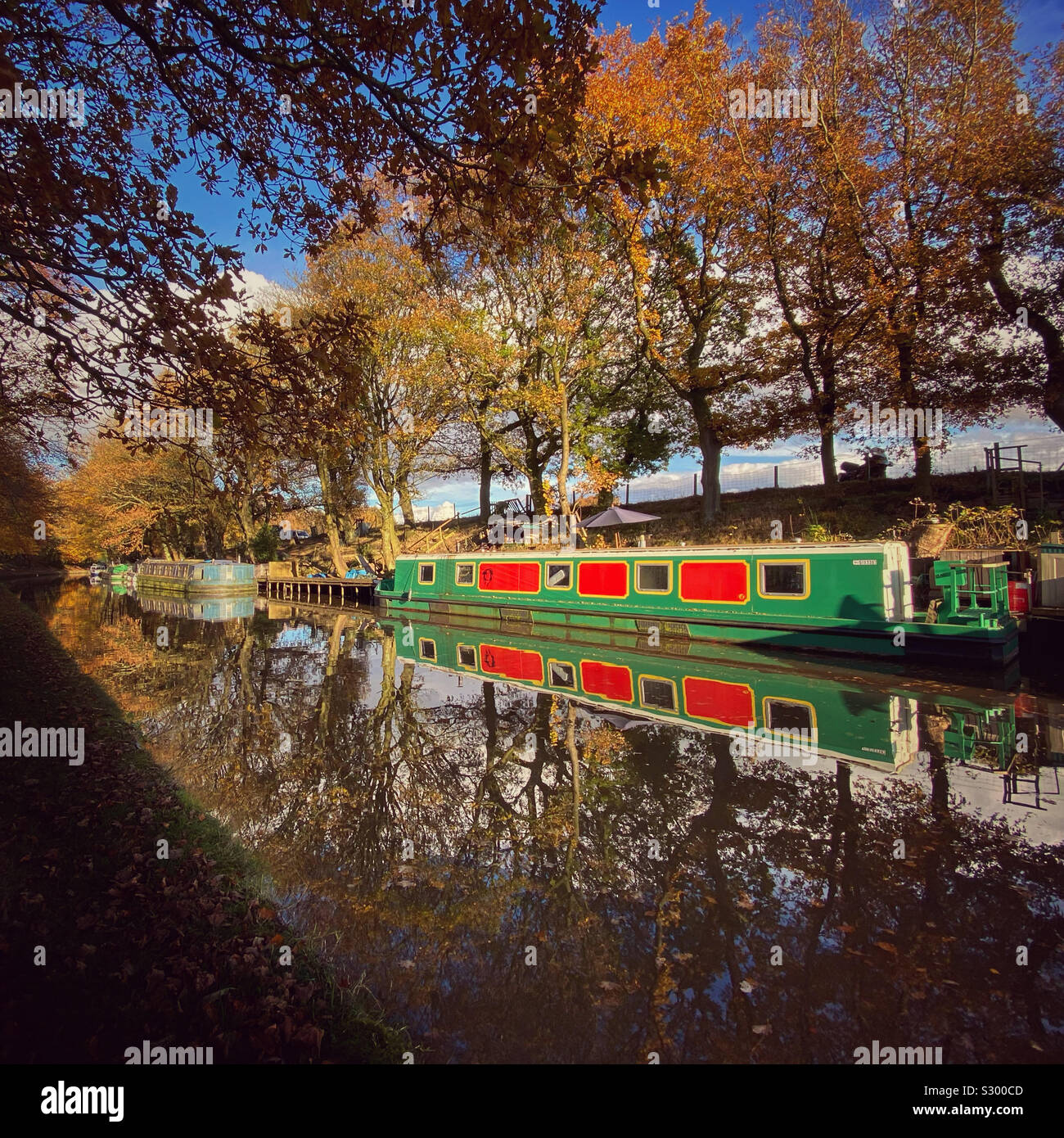 Narrow boats moored on Leeds and Liverpool Canal at Adlington in Lancashire - Smartphone Captured Stock Image