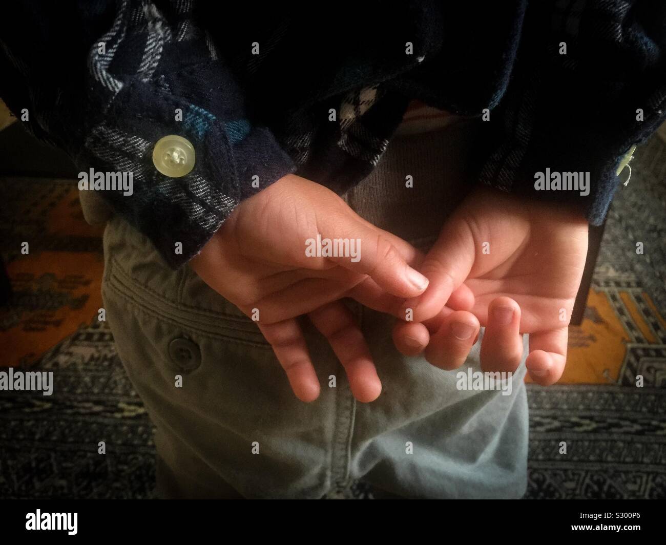 Two-years old contemplative hands - Smartphone Captured Stock Image