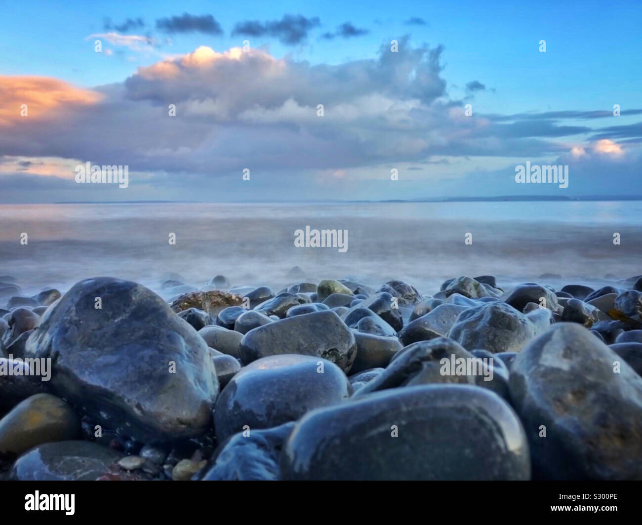 Pebbles on a beach, Penarth, South Wales. - Smartphone Captured Stock Image