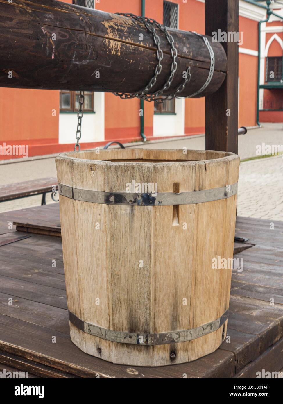 Russian/Slavic ancient wooden well’s bucket in Kaluga, Russia. Stock Photo