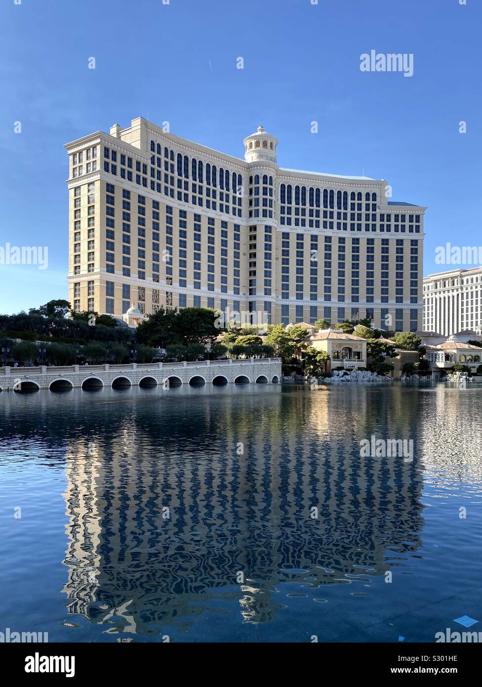 View of Bellagio in Las Vegas with reflections of the building on the water Stock Photo