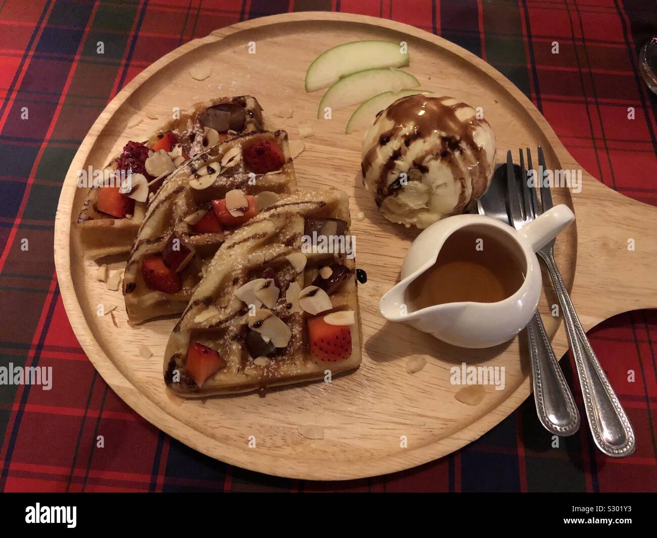 Strawberry waffles and ice cream. - Smartphone Captured Stock Image