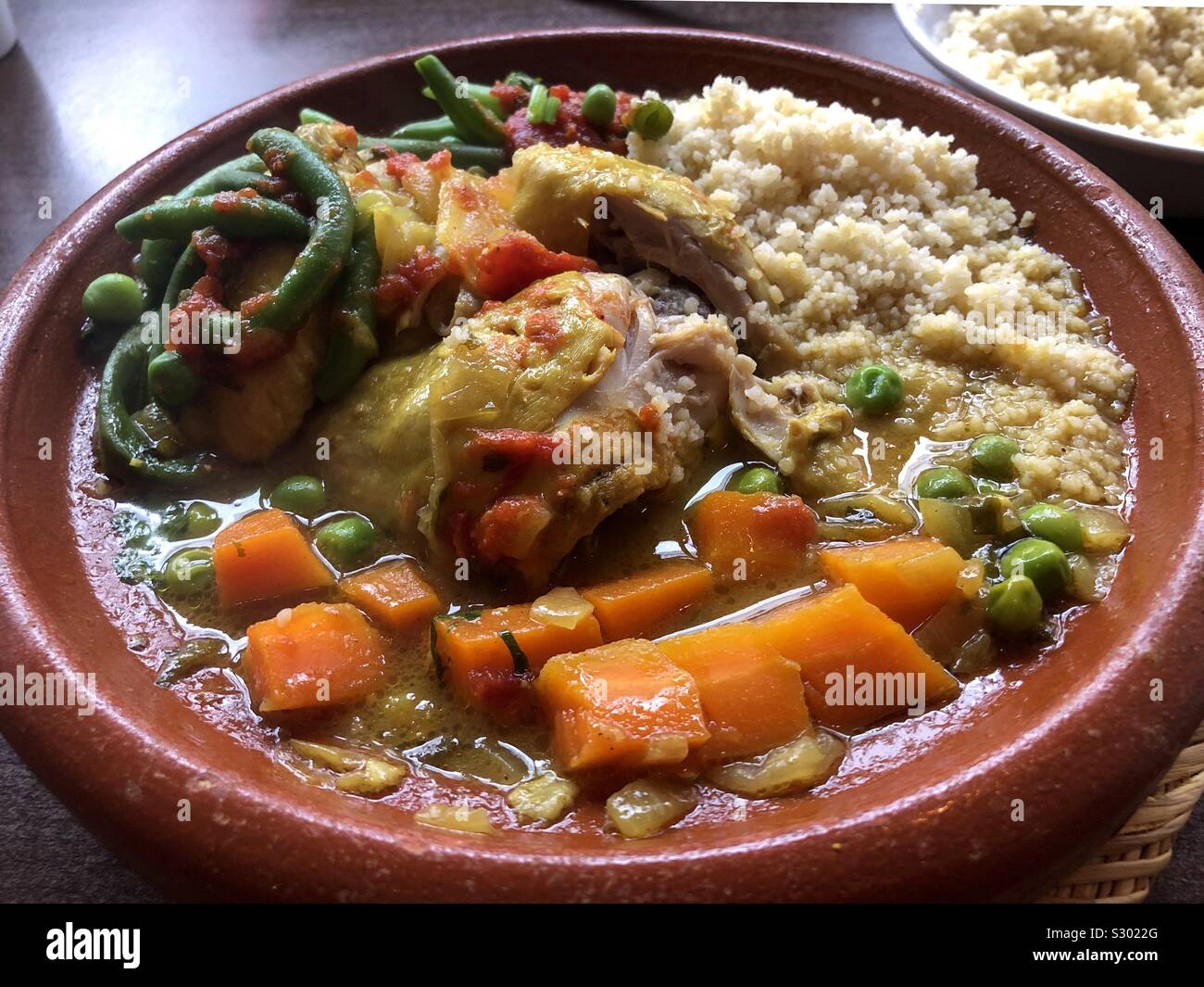 Chicken tagine with cous cous and vegetables Stock Photo Alamy