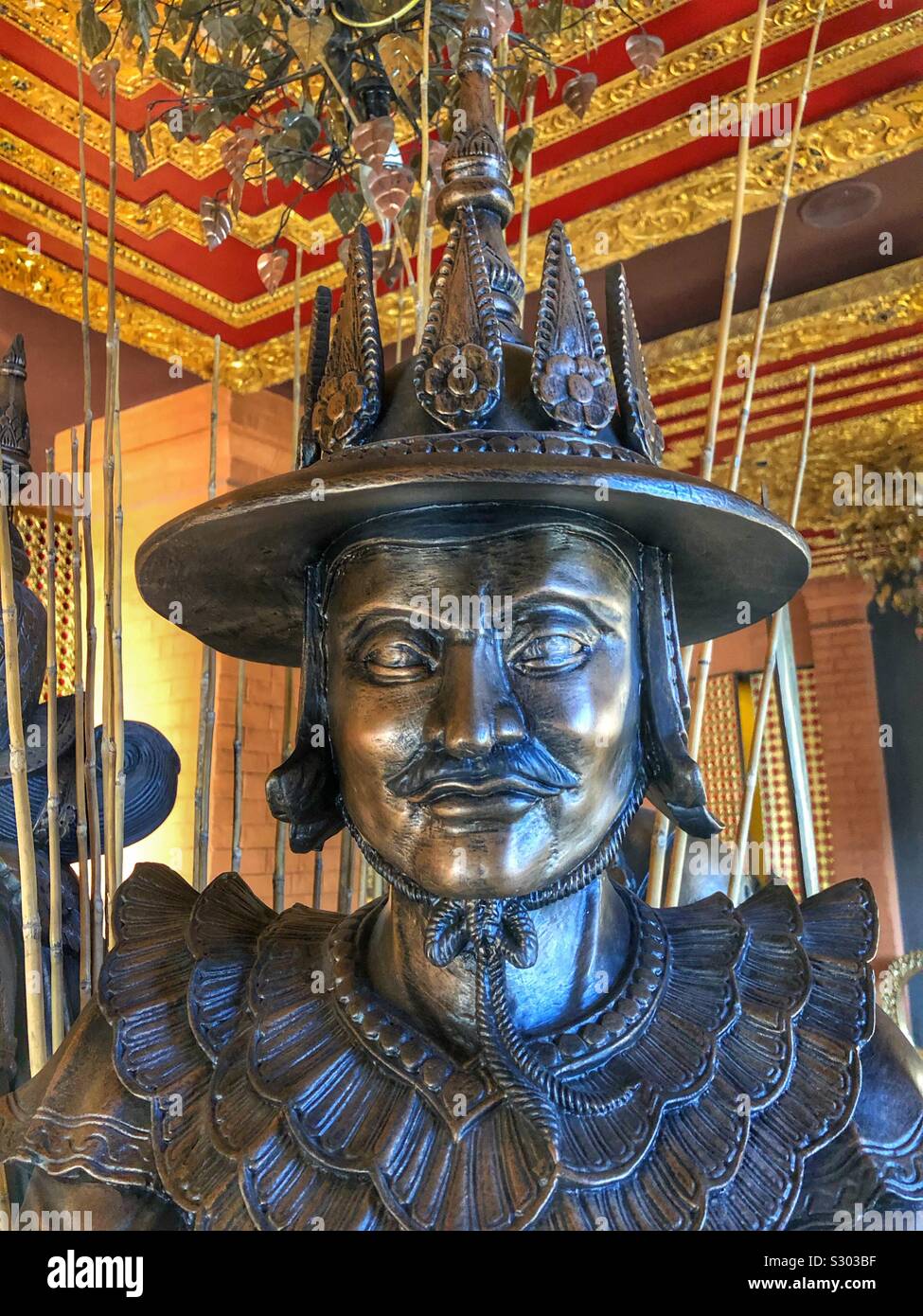 Close up of a bronze statue of a Bagan King in Mandalay, Myanmar. - Smartphone Captured Stock Image