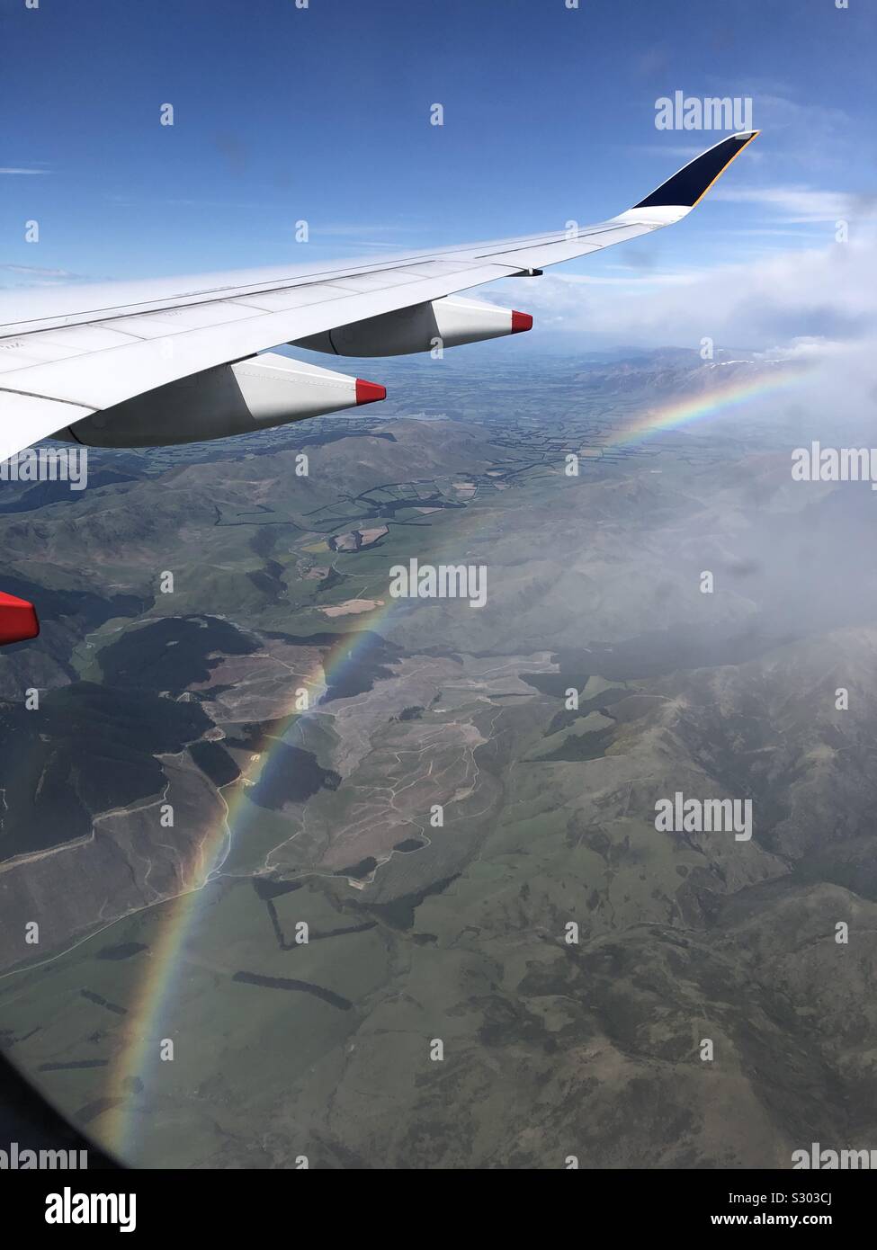Rainbow in the sky over New Zealand - Smartphone Captured Stock Image