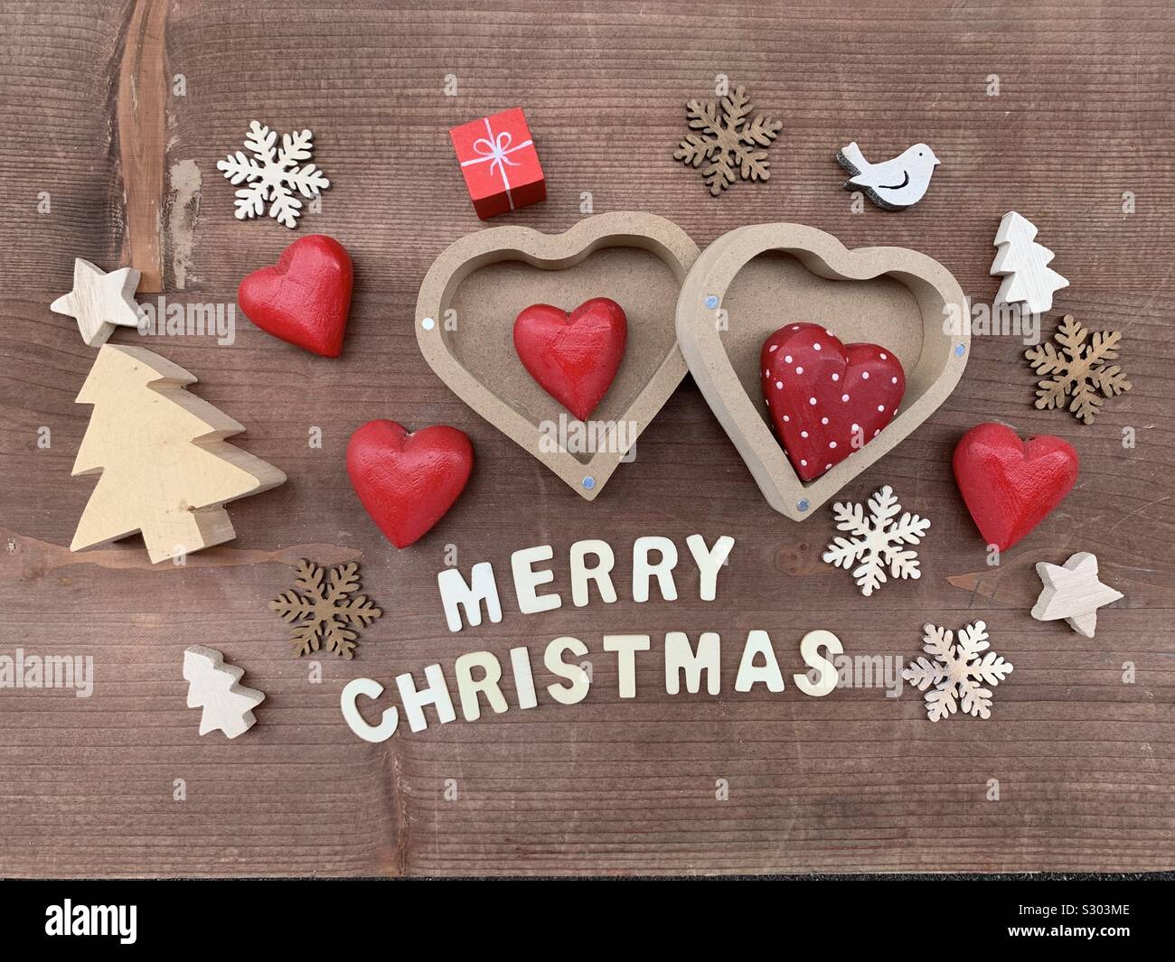 Merry Christmas with creative wooden ornaments - Smartphone Captured Stock Image