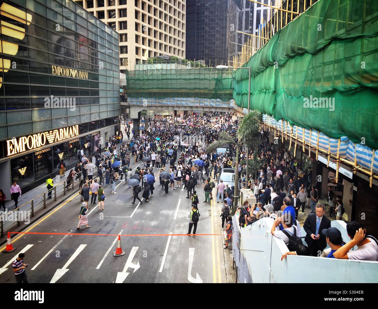 Office workers in Hong Kong’s CBD protest during their lunch break, November 2019 - Smartphone Captured Stock Image
