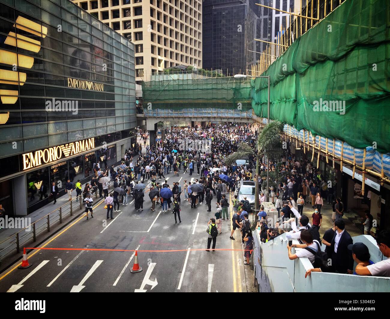 Office workers in Hong Kong’s CBD protest during their lunch break, November 2019 - Smartphone Captured Stock Image