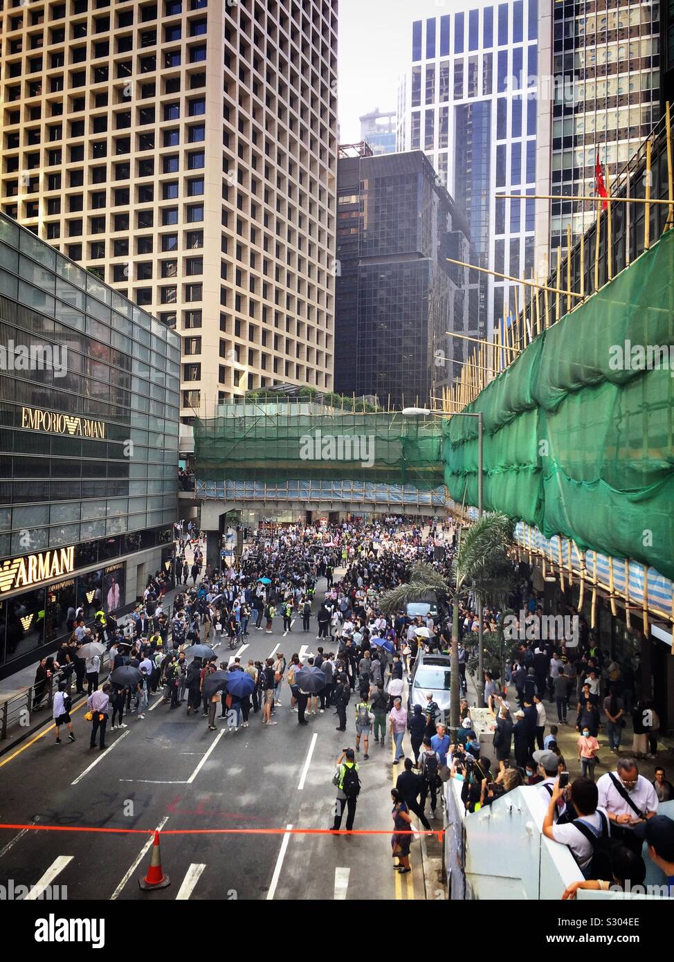 Office workers in Hong Kong’s CBD protest during their lunch break, November 2019 - Smartphone Captured Stock Image